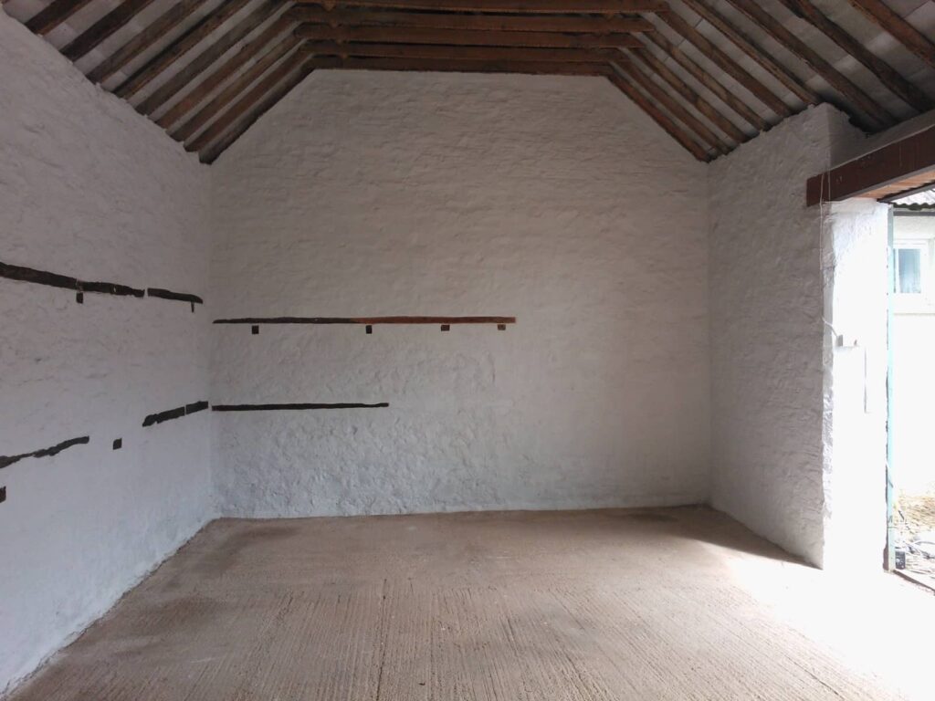 Barn Interior Painted with Super White Earles Masonry Paint